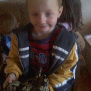 My son Dominic holding Ball Python