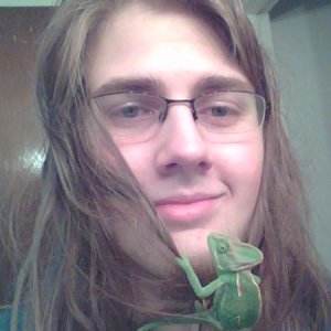 I'm thinking he likes me, because he enjoys being in my hair, he'll climb right up and ill hold my hand under him in case he falls.