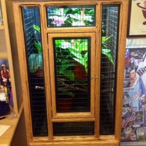 Overall cage: left side and back of the cage have been covered with a very fine garden mesh to provide a more secure feel for the chameleon, and also