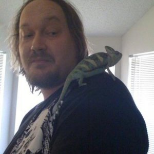 Fred at 11 months sitting on Andy's shoulder