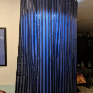 Enclosure with Curtain Drawn