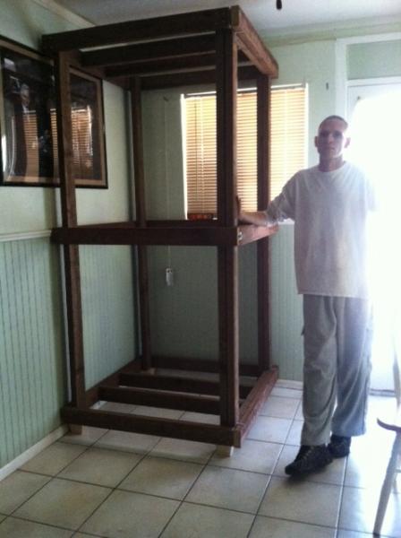 new cage before bare - wonderful husband to show height. 7ft x 3ft.