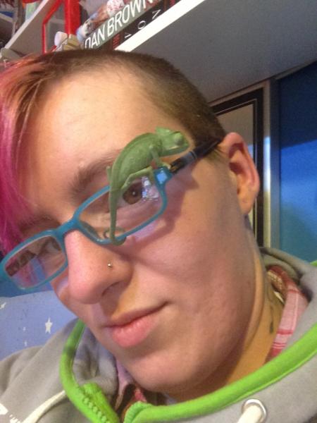 This just amuses me cos of the way she has her little tail wrapped around the inside of my glasses.